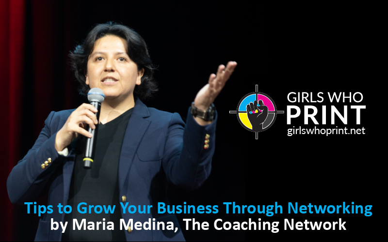 professional latina woman speaking on a microphone about career coaching girls who print